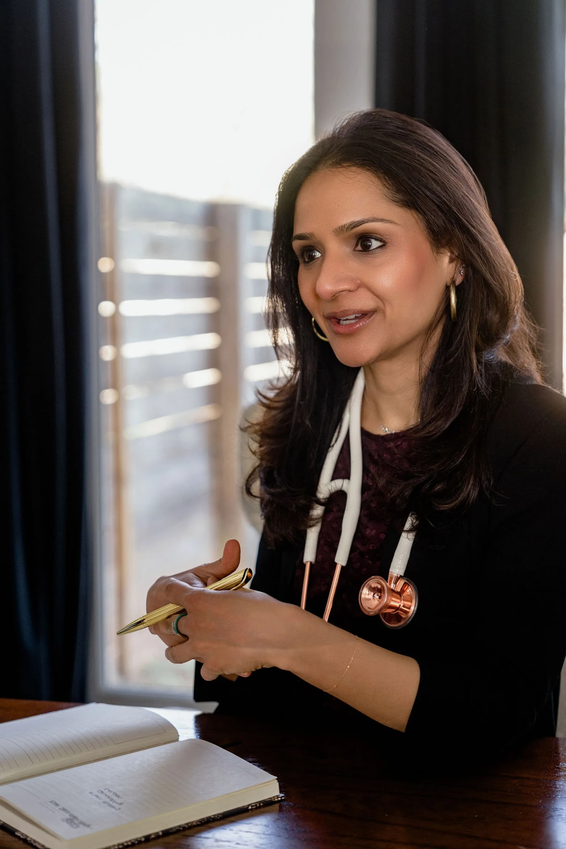 Dr. Deepti Agarwal consulting with a patient